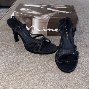 Gently used nina black luster heels